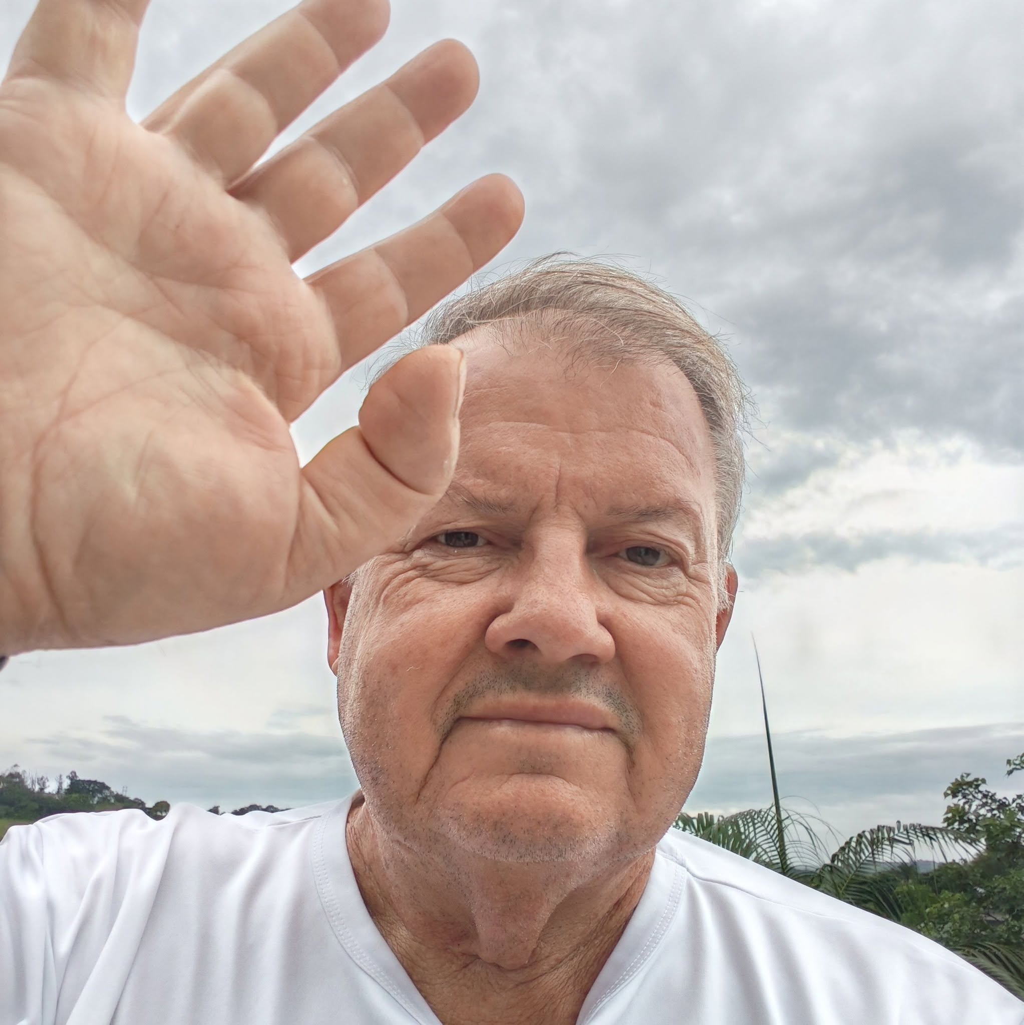 Jaco Pretorius waving on the beach at Ballito